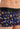 Close-up view of a men model wearing HO black print  Trunk