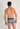 Back view of a men model wearing HO navy print  Trunk