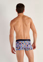 Back view of a men model wearing HO navy print  Trunk