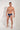 Full-body view of a men model wearing HO navy print modal/viscose/tencel Briefs HO1