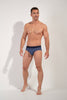 Full-body view of a men model wearing HO navy print modal/viscose/tencel Briefs HO1