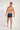 Full-body view of a men model wearing HO black print modal/viscose/tencel Boxer Briefs
