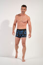 Full-body view of a men model wearing HO black print modal/viscose/tencel Boxer Briefs