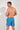 Back view of a men model wearing HO blue print  Beach Boxer