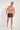 Full-body view of a men model wearing HO black print modal/viscose/tencel Boxer Briefs