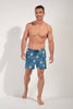 Full-body view of a men model wearing HO blue print  Beach Boxer