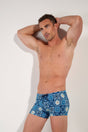 Front view of a men model wearing HO blue print  Swim Shorts