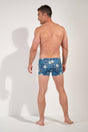 General view of a men model wearing HO blue print  Swim Shorts