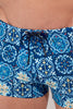 Close-up view of a men model wearing HO blue print  Swim Shorts