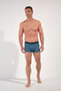 Full-body view of a men model wearing HO blue print/black/black cotton Boxer Briefs 3p
