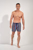 Full-body view of a men model wearing HO multicolor stripes  Beach Boxer