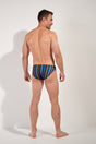 General view of a men model wearing HO multicolor stripes  Swim Micro Briefs