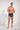 Full-body view of a men model wearing HO multico print  Trunk