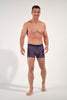 Full-body view of a men model wearing HO red print modal/viscose/tencel Comfort Boxer Briefs