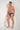 Full-body view of a men model wearing HO red print modal/viscose/tencel Comfort Briefs