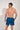 Back view of a men model wearing HO blue print  Beach Boxer