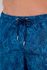 Close-up view of a men model wearing HO blue print  Beach Boxer