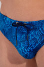 Close-up view of a men model wearing HO blue print  Swim Mini Briefs