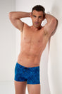Front view of a men model wearing HO blue print  Swim Shorts
