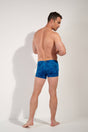 General view of a men model wearing HO blue print  Swim Shorts