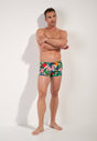 Full-body view of a men model wearing HO multico print  Swim Shorts
