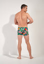 General view of a men model wearing HO multico print  Swim Shorts