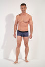 Full-body view of a men model wearing HO blue print  Trunk