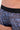 Close-up view of a men model wearing HO blue print  Trunk