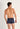 Back view of a men model wearing HO navy/navy stripes/grey cotton Boxer Briefs 3p