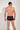 Back view of a men model wearing HO black  Trunk