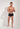 Full-body view of a men model wearing HO black  Trunk