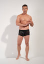 Full-body view of a men model wearing HO black  Trunk