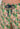 Close-up view of a men model wearing HO green print  Beach Boxer