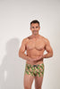 Front view of a men model wearing HO green print  Swim Shorts