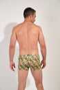Back view of a men model wearing HO green print  Swim Shorts