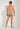 General view of a men model wearing HO green print  Swim Shorts