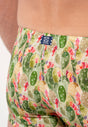 General view of a men model wearing HO green print  Swim Shorts
