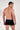 Back view of a men model wearing HO black/black/black cotton Boxer Briefs HO1 3p