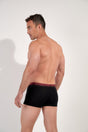 General view of a men model wearing HO black/black/black cotton Boxer Briefs HO1 3p