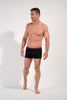 General view of a men model wearing HO black/black/black cotton Boxer Briefs HO1 3p