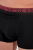 General view of a men model wearing HO black/black/black cotton Boxer Briefs HO1 3p