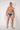 Full-body view of a men model wearing HO navy print  Swim Mini Briefs