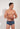 Front view of a men model wearing HO navy print  Swim Trunk