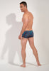 General view of a men model wearing HO navy print  Swim Trunk