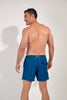 Back view of a men model wearing HO navy print  Beach Boxer