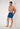Full-body view of a men model wearing HO navy print  Beach Boxer