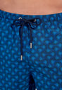 Close-up view of a men model wearing HO navy print  Beach Boxer