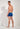 General view of a men model wearing HO navy print  Swim Shorts
