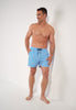 Full-body view of a men model wearing HO blue/white stripes  Beach Boxer