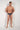 Full-body view of a men model wearing HO navy print modal/viscose/tencel Mini Briefs